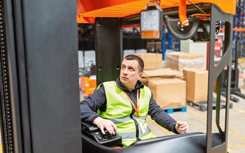 A man is working in the logistic sector.