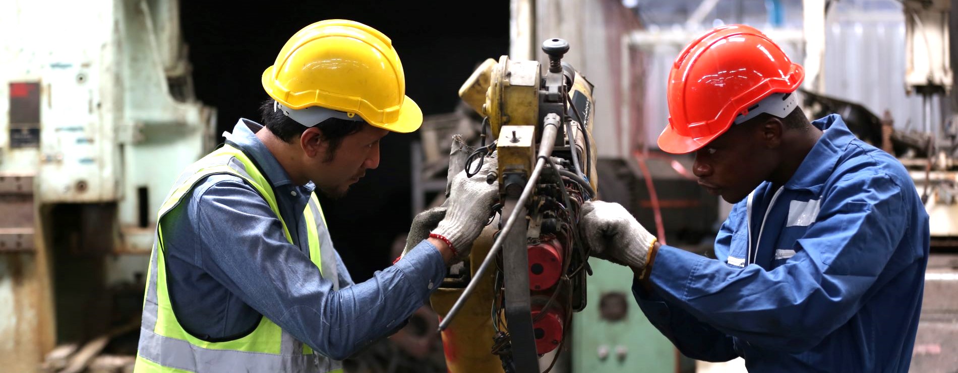 Two employers working at a mechanic company.